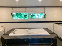 Master bathroom with bathtub